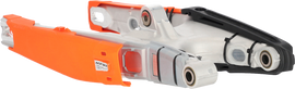 Acerbis Teketmagnet orange swingarm guard for KTM motorcycles, mounted on a black swingarm, with visible branding and protective design.