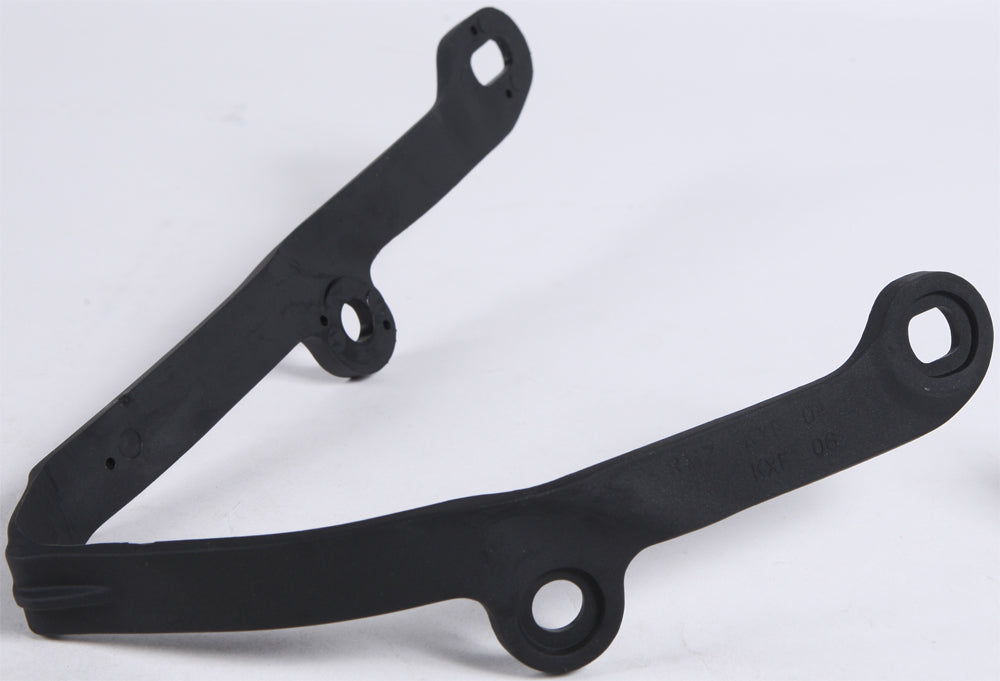 Acerbis black chain slider for drive chain, part number 20815-70001, shown in close-up on a motorcycle chain assembly.