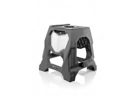 Acerbis 711 grey bike stand supporting a bicycle in an outdoor setting, made of durable material for motorcycle or bicycle maintenance.