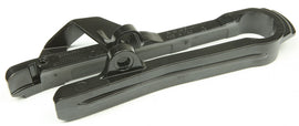 Black Acerbis chain slider for motorcycles, model 24211-30001, mounted on a bike's chain and sprocket system.