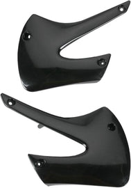 Black Acerbis radiator shrouds for off-road motorcycles, featuring a durable plastic construction and sleek design.