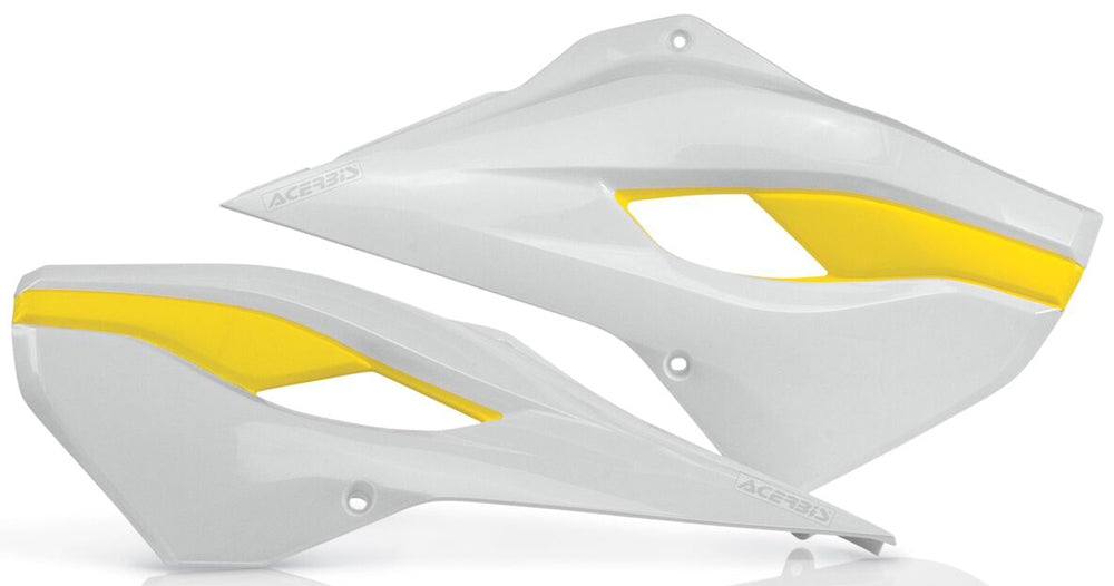 Acerbis radiator shrouds in white and yellow for motorcycle, designed for optimal cooling and style.