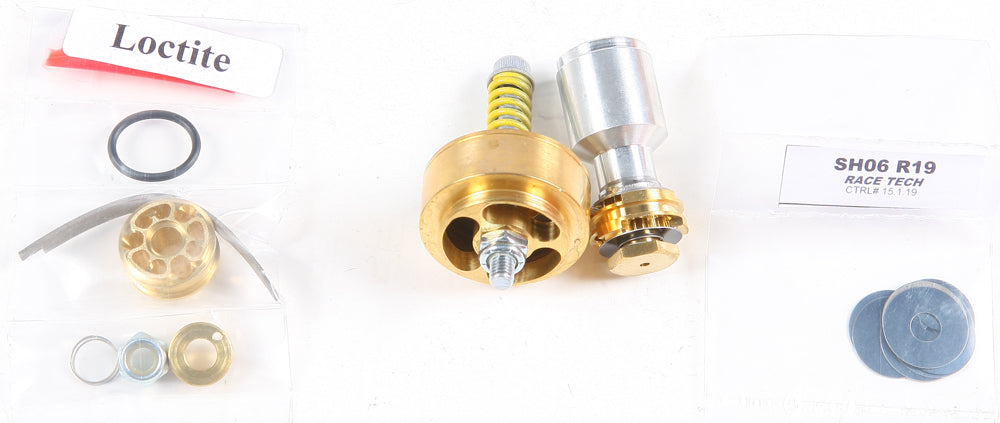 Race Tech Gold Valve Fork ST11 suspension component shown with detailed metal parts and branding for motorcycle or dirt bike use.