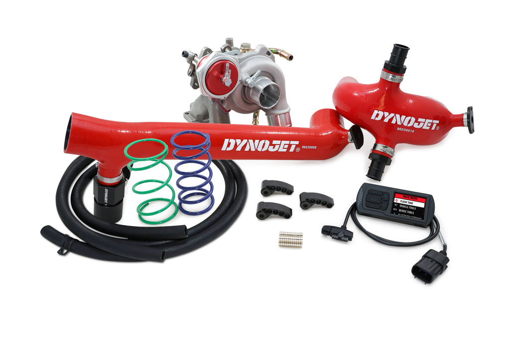 Dynojet Research Stage 4 Engine Management Kit with wires, connectors, and electronic components for motorcycle tuning.