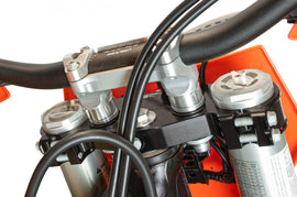 Enduro Engineering Trail Tool 366-221023, a compact multi-tool for motorcycle trail maintenance, with various tools folded inside.