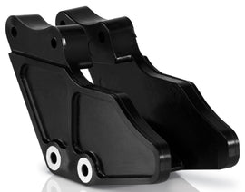 Acerbis black 1-piece chain guide blocks for drive system, showing the durable plastic construction with mounting features.