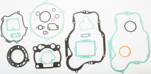 Load image into Gallery viewer, Athena Complete Gasket Kit for Kawasaki 68-0457, featuring various gaskets and seals laid out on a white background.