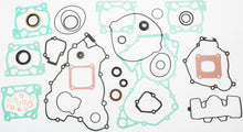 Load image into Gallery viewer, Athena complete gasket kit with seals for Husqvarna and KTM 68-0700, featuring gaskets and seals for engine maintenance.