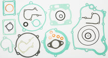 Load image into Gallery viewer, Athena Complete Gasket Kit for Yamaha 68-0635 showing various gaskets and seals laid out for engine repair.