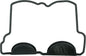 Athena valve cover gasket for Kawasaki engines, showing the rubber seal and metal components in a close-up view.