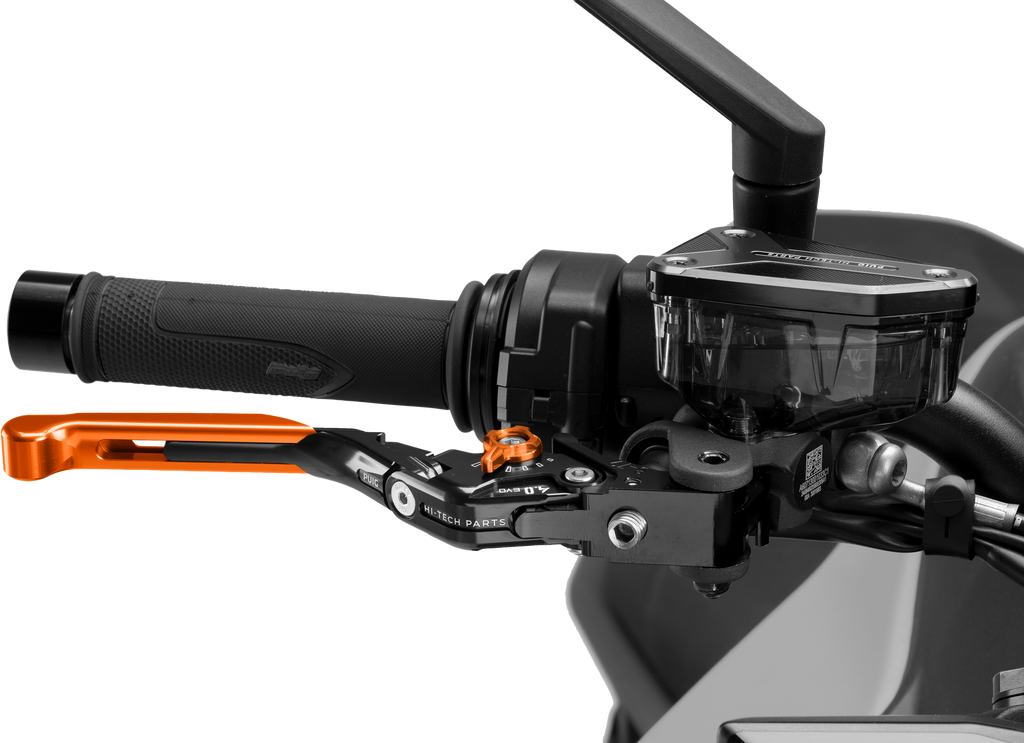 PUIG Brake Lever 4.0 Fold and Extend in orange for motorcycle, showcasing the ergonomic design and vibrant color.