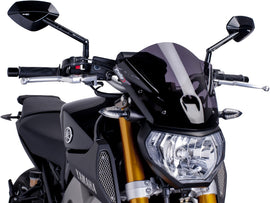 PUIG Naked New Gen Sport dark smoke windshield with aerodynamic shape and mounting brackets, designed for motorcycle protection.