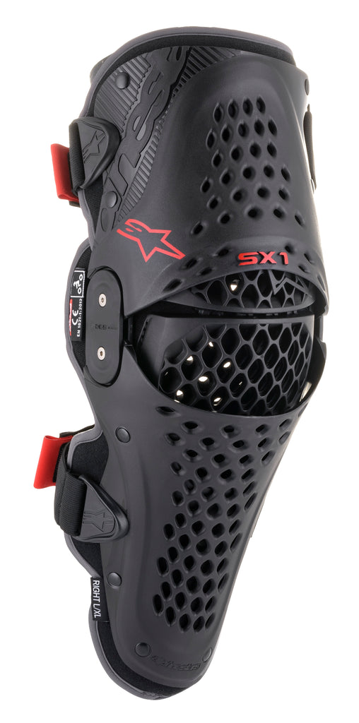 Alpine Star Sx-1 V2 knee protector in black and red, showing the padded knee guard with adjustable straps and branding details.