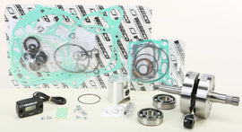 Wiseco engine rebuild kit for Garage Buddy Suz PWR121-100, showing various engine components and parts laid out.