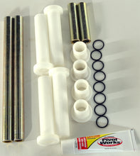Charger l'image dans la galerie, Pivot Works upper rear A-arm kit for suspension, featuring durable components, shown in a close-up view with various parts.