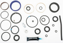 Load image into Gallery viewer, Fox Float 3 suspension rebuild kit for one shock, showing various internal components and seals for Fox bike shock maintenance
