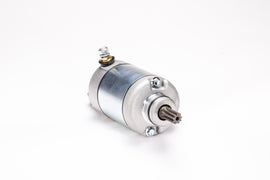 Ricks Motorsport Electric starter motor 27-61106 for motorcycles, showing the compact, metallic starter device with wiring connections.