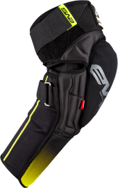 Black and hi-vis green EVS TP199 knee and shin guard, protective safety gear for knee and shin protection in size small/medium.