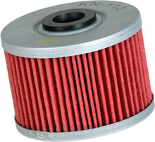 Load image into Gallery viewer, K&amp;N Oil Filter 56-0112 showing the cylindrical filter with metal end caps and threaded center for automotive oil filtration
