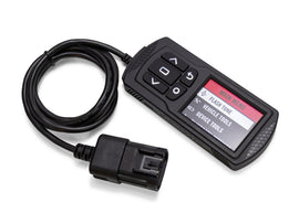 Dynojet Research Power Vision 3 engine management device mounted on a motorcycle dashboard with cables and display screen.