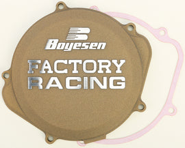 Boyesen magnesium racing clutch cover for Honda CRF250 motorcycle, showcasing its sleek magnesium finish and robust design.