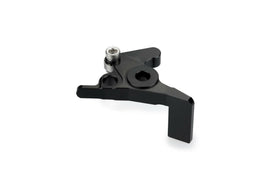 Black PUIG lever adapter for brake levers, shown installed on motorcycle handlebar with detailed close-up of the lever and adapter.