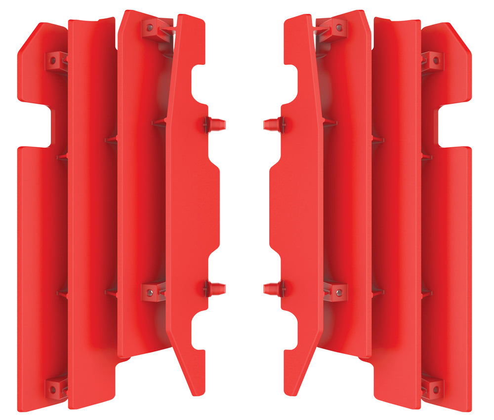 Red Polisport Plastics radiator louvers with vented design, designed for motorcycle radiators, shown in close-up detail.