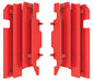 Polisport Plastics radiator louvers in red, model 64-56530, designed for motorcycle radiators, shown in the image.
