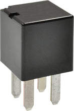 Load image into Gallery viewer, SMP relay switch model 275-01097 with metallic contacts and black plastic casing, used for electronic control applications.