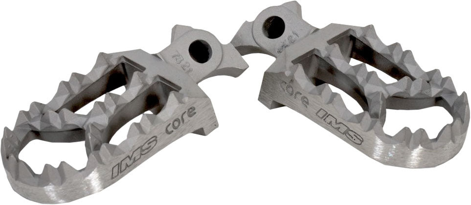 IMS Core MX Yamaha footpegs for motorcycle foot controls, featuring durable metal construction and textured grip surfaces.