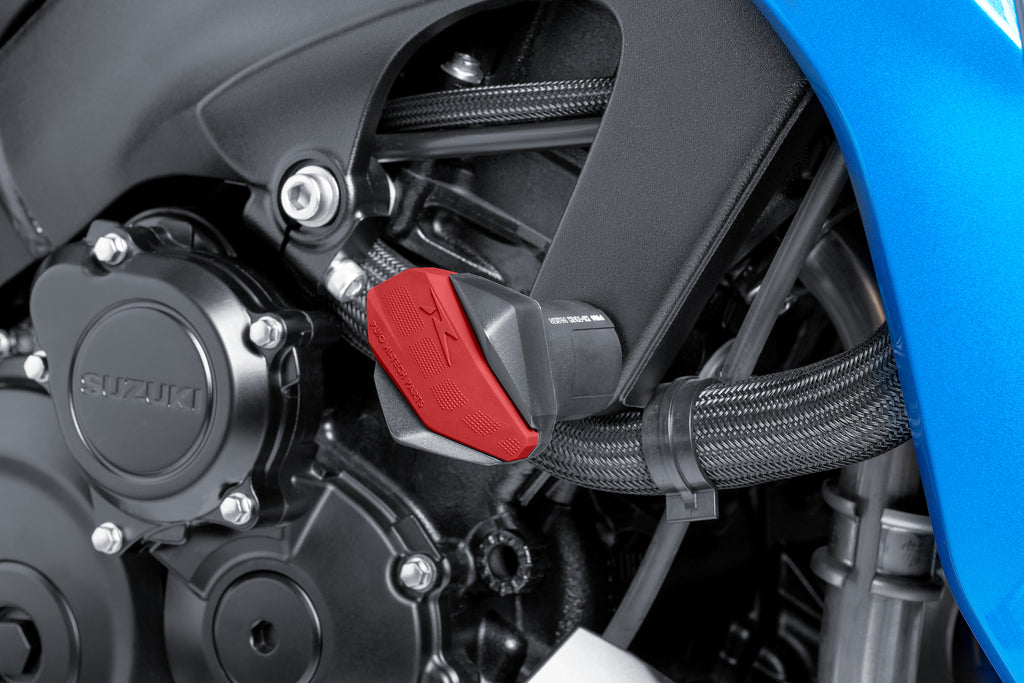 Red PUIG Frame Slider R12 End body protection mounted on a motorcycle frame, showcasing durable body crash protection.