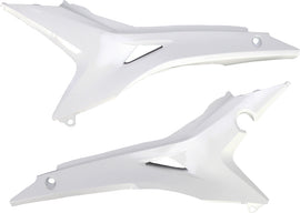 White Acerbis airbox cover for motorcycle, featuring the Acerbis logo and vent openings for optimal airflow and protection.