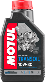 Bottle of Motul Trans Oil 10W30 automotive transmission fluid, labeled with product code 82-2106, in a clear container.