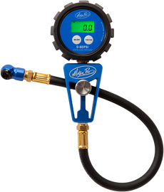 Motion Pro digital tire gauge showing 60 psi, with a digital display and compact design for motorcycle and vehicle tire pressure measurement.