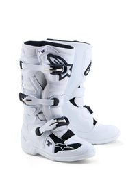 Alpine Star Tech 7s motocross boots in white, featuring sturdy design and protective features for off-road riding.