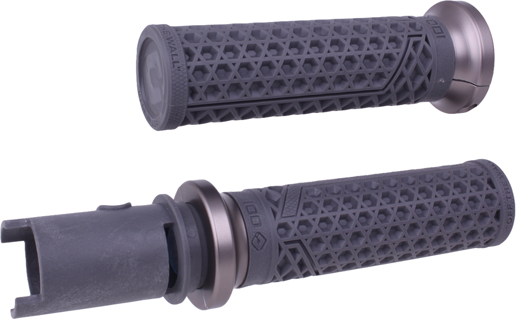 ODI Grips Van'S Lock-On grips in graphite and gun metal for BMX or mountain bikes, featuring textured surface and lock-on design.
