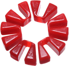 Load image into Gallery viewer, Energy Suspension Poly Cush Drive in red, designed for drive systems, showing the durable rubber component with metal fittings.