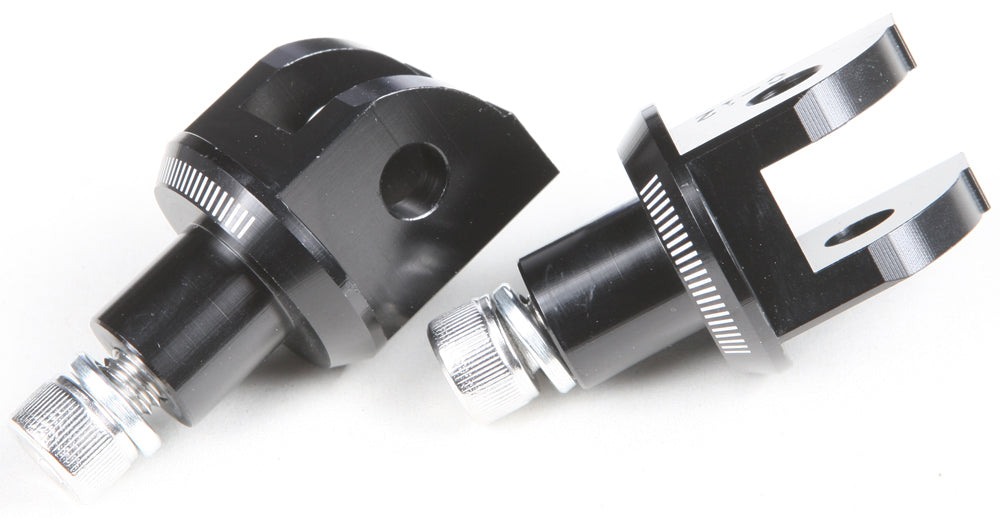 Black PUIG footpeg adapter for KTM motorcycle, designed for foot controls, with sturdy metal construction and secure mounting features.