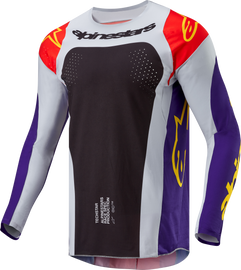 Alpine Star Techstar Ocuri cycling jersey in hot orange, purple, and black, displayed on a hanger.