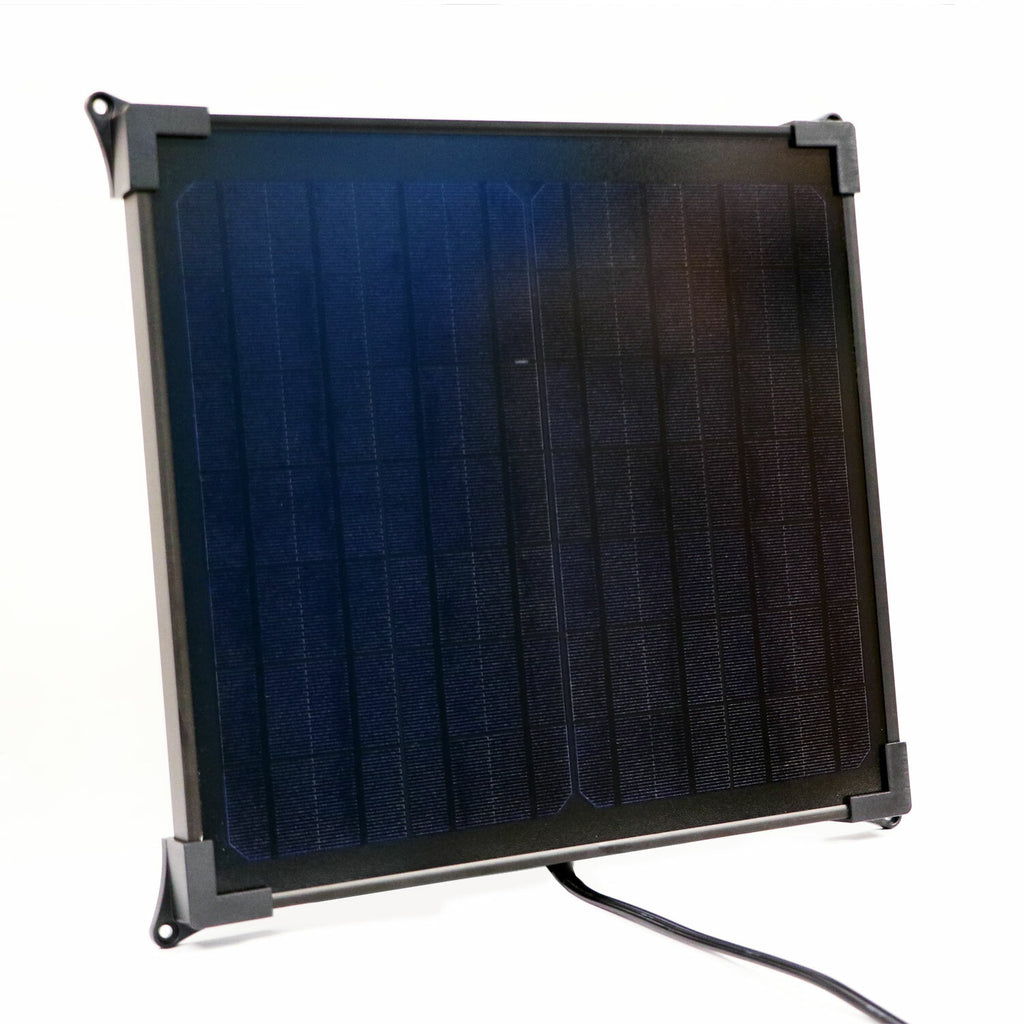 Battery Tender 17 Watt mountable solar panel with built-in controller for battery charging and maintenance, shown outdoors.