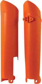 Orange Acerbis fork guard with black mounting brackets for motorcycle suspension protection.