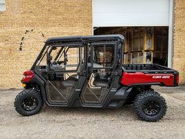 OPEN TRAIL full UTV cab with roof and doors, featuring sturdy construction and clear windows for off-road protection.