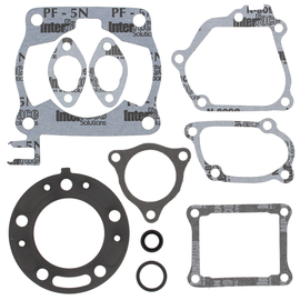 Vertex Top End Gaskets 681-0235 set showing detailed rubber seals and gaskets for engine top end repair.