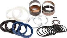 Load image into Gallery viewer, Pivot Works suspension seal and bushing kit for forks, showing various seals and bushings arranged on a white background.