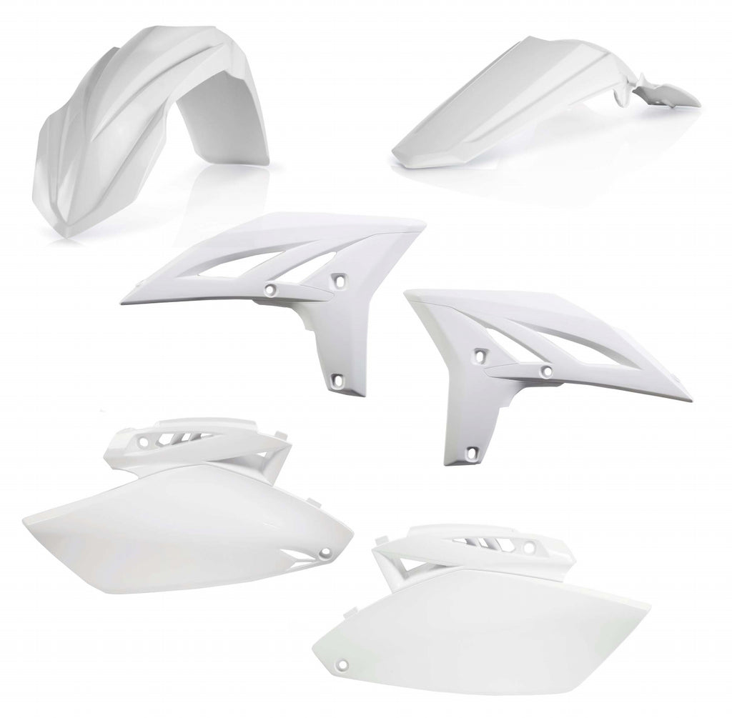 Acerbis white plastic kit with various molded plastic parts for motorcycle or off-road vehicle repair and customization.