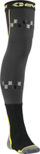 Charger l'image dans la galerie, Black and hi-vis youth Fusion Socks by EVS featuring reinforced toes and vibrant safety accents for active footwear.