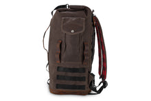 Load image into Gallery viewer, Dark oak Burly Brand sissy bar bag on motorcycle luggage rack, showing durable material and secure straps for motorcycle storage.