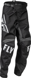 Fly Racing Youth F-16 motocross pants in black and white, size 26, featuring durable fabric and secure fit for young riders.