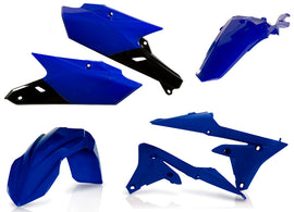 Acerbis blue plastic kit for motorcycle, includes various blue plastic panels and parts, laid out on a neutral surface.