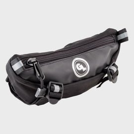 Giant Loop Zigzag handlebar bag in black, designed for motorcycle luggage, mounted on a bike handlebar.